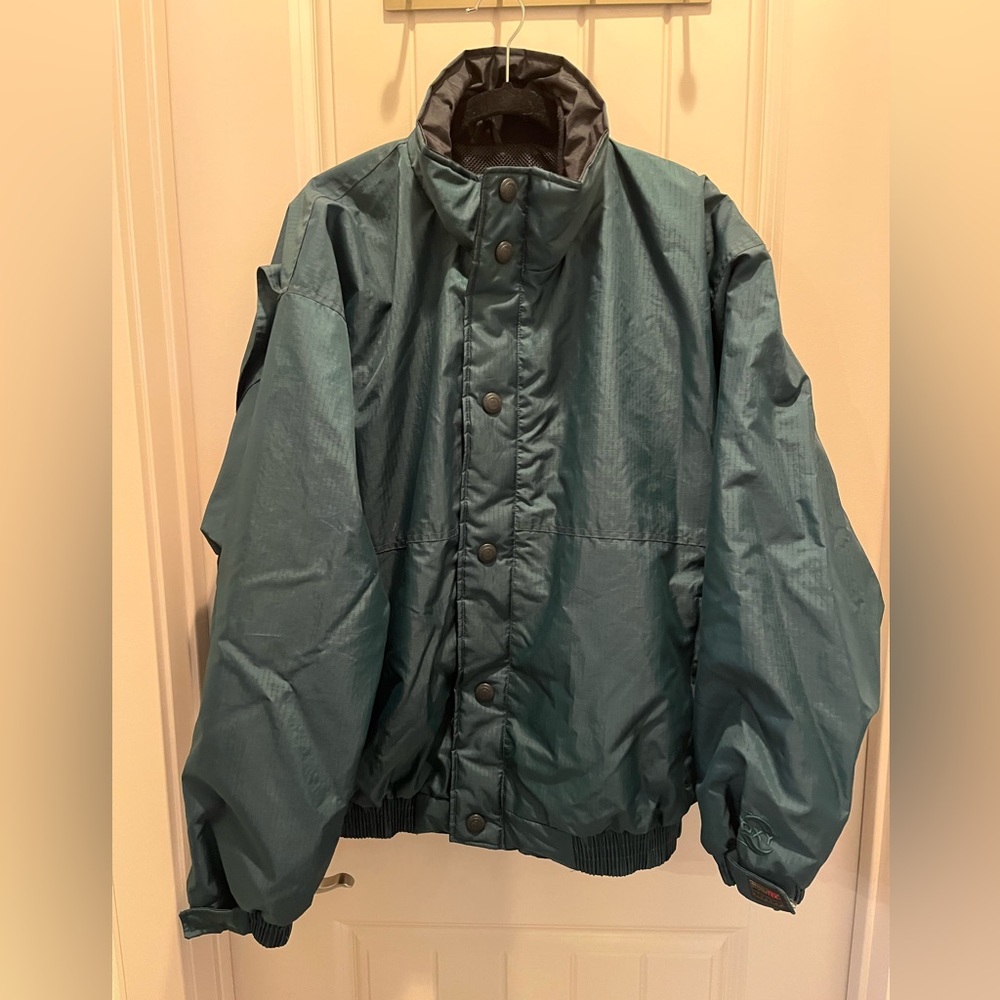 Storm Tech green like new zip men’s mesh lined jacket.